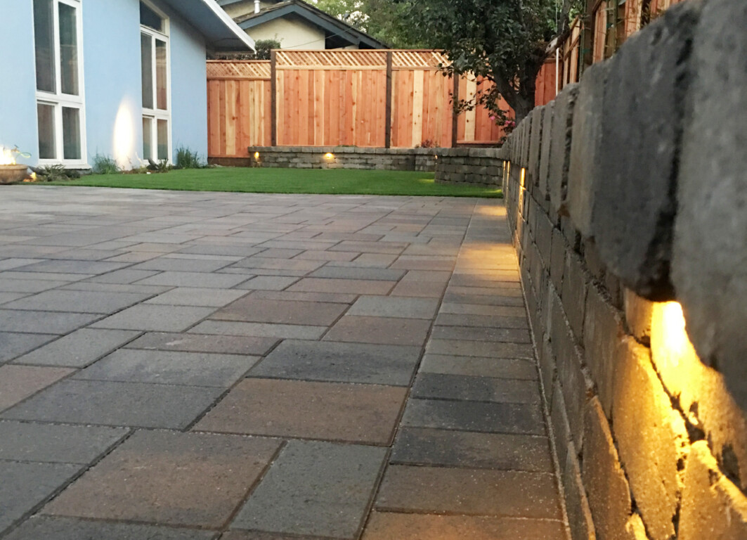 Elegant stamped concrete patio with lighting in Delano